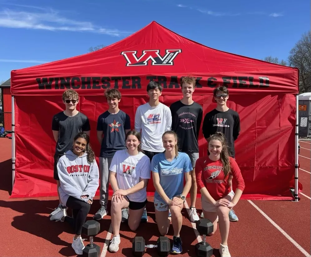 WHS Track and Field team thanks En Ka Society for grant