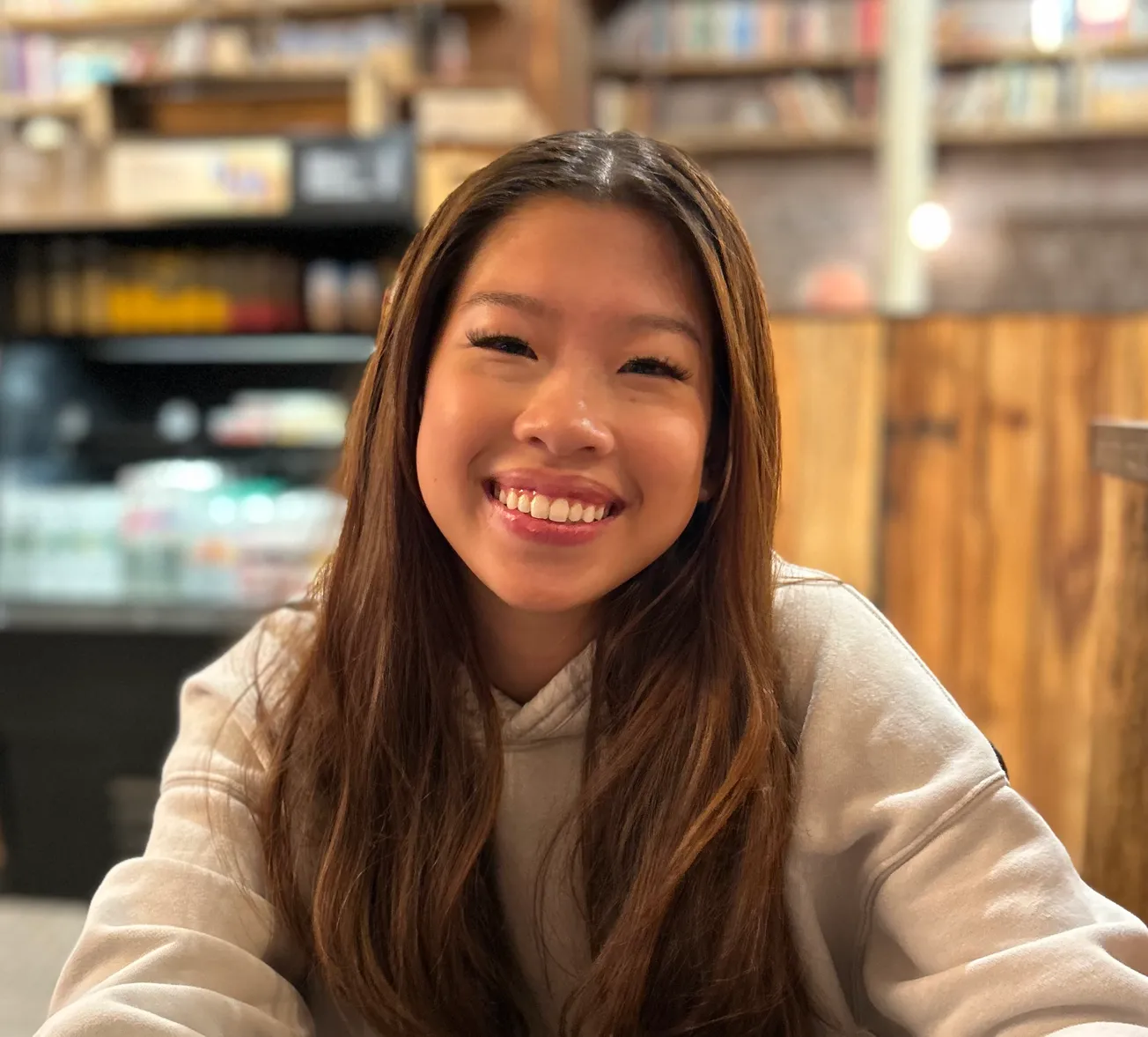 Helpers Among Us - WHS junior Alanna Lee baking cupcakes for California wildfire victims